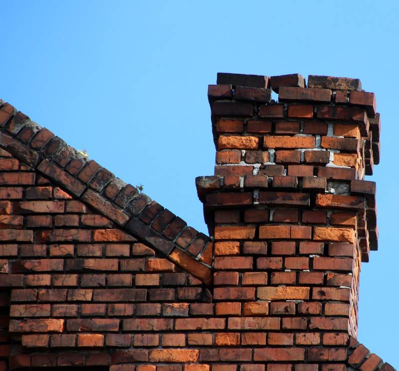 Signs Your Prospect Heights Home Needs a Chimney Inspection Damaged chimney on an Prospect Heights home showing cracks and missing mortar